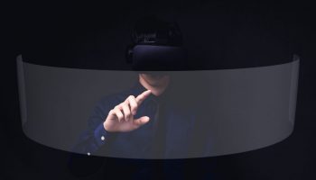 People wearing VR glasses with a screen